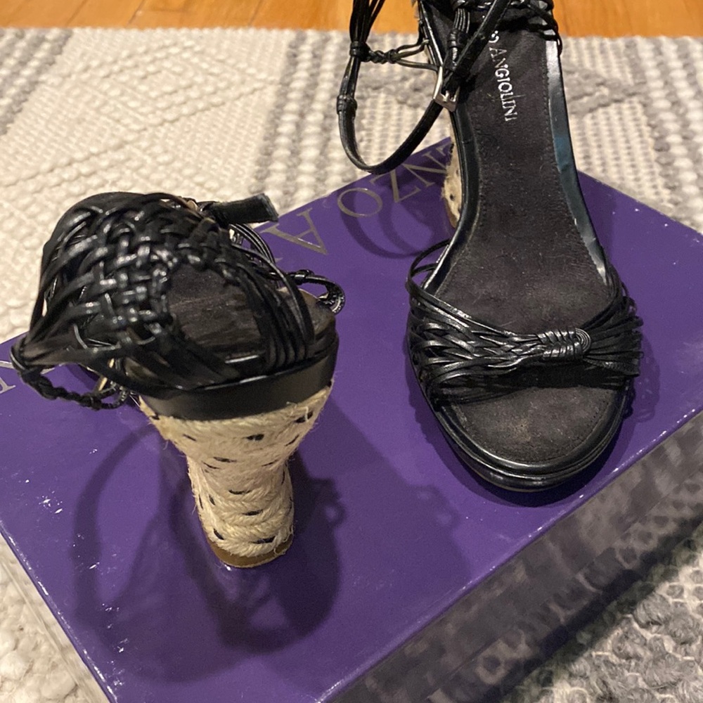 Black leather espadrilles.  Gently worn.